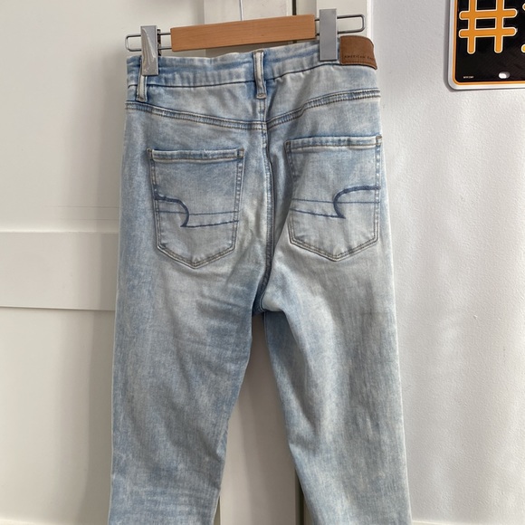Light Wash Jeans with holes that have fabric underneath - Picture 4 of 5